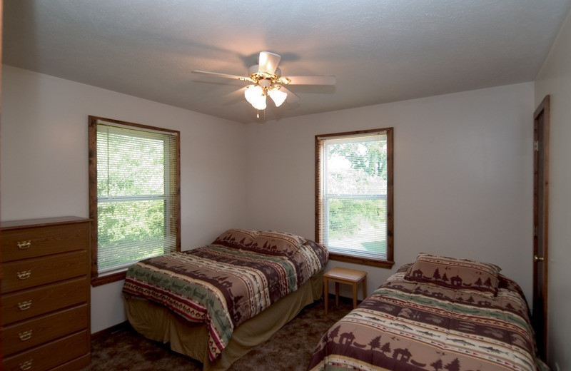 Cottage bedroom at Norfork Resort & Trout Dock.