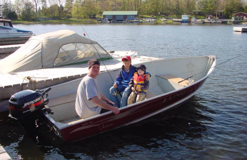 Boating at Hall's Housekeeping Cottages.