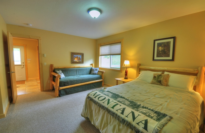 This is one of the bedrooms in our 3 bedroom deluxe cabin. The 3 bedroom cabin can sleep a total of 10 people comfortably. Best of all it's located only 1/2 mile from Glacier National Park