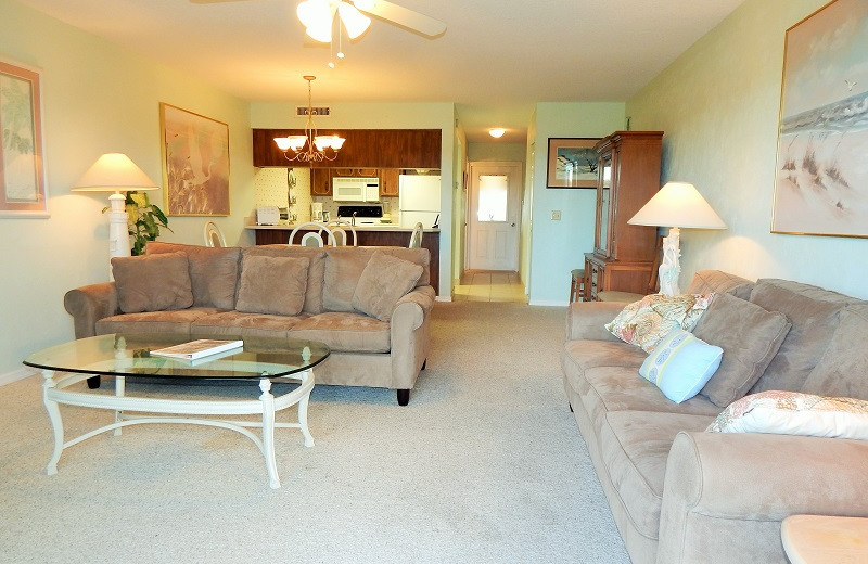 Rental living room at Family Sun Vacation Rentals.