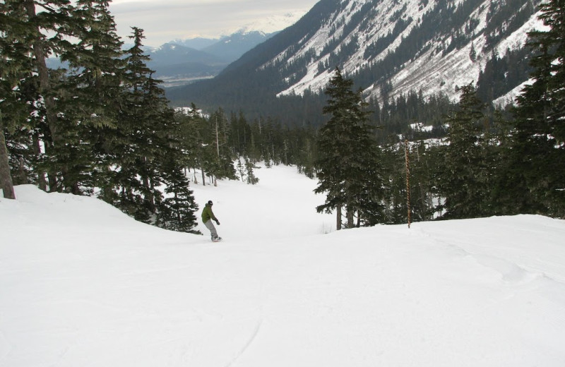 Snowboarding at Pearson's Pond Luxury Inn and Adventure Spa.