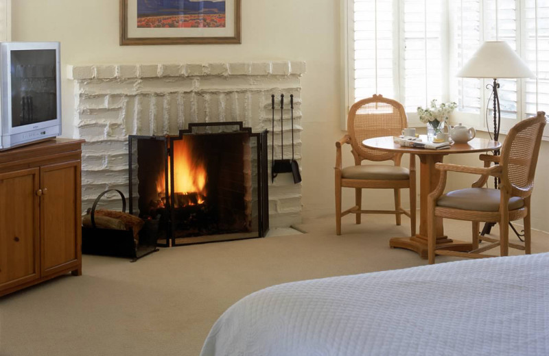 Guest room with fireplace at Smoke Tree Ranch.