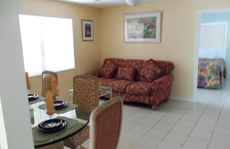 Couch and dining table view at Coral Bay Resort.