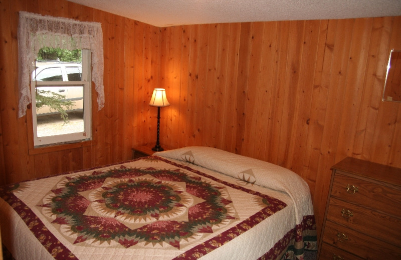 Cabin bedroom at Bay View Lodge.