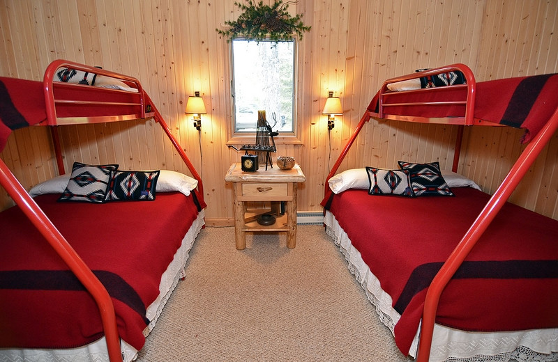 Cabin bedroom at North Country Vacation Rentals.