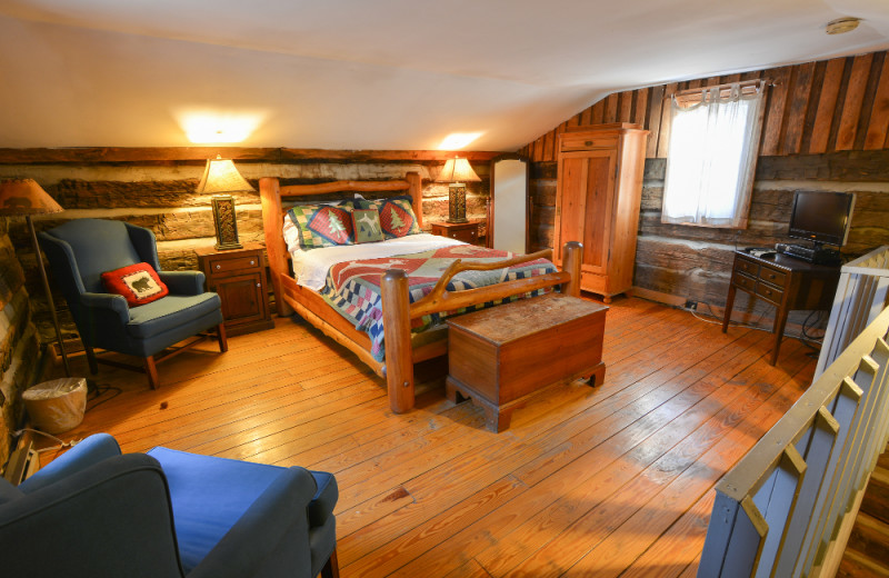 Cabin bedroom at Pilot Knob Inn Bed & Breakfast.