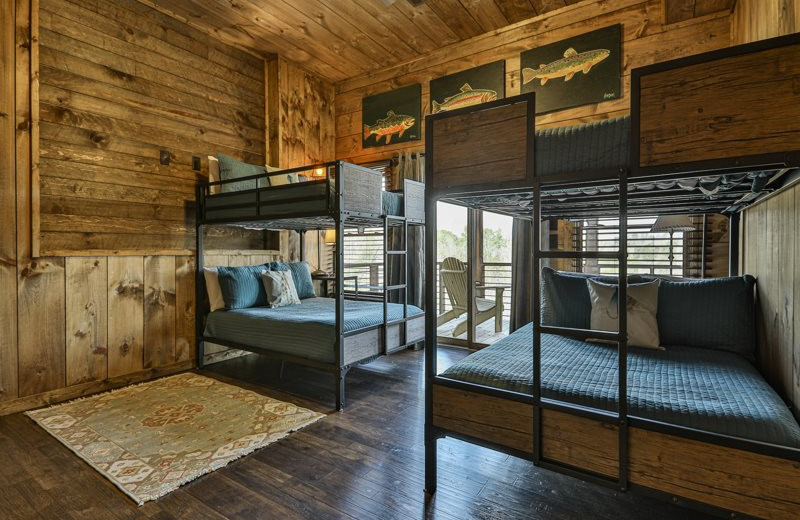 Cabin bunk beds at Mountain Oasis Cabin Rentals.