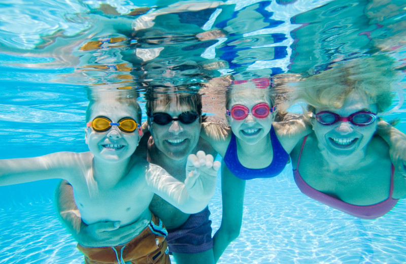 Family swimming at Split Rock Resort & Golf Club.