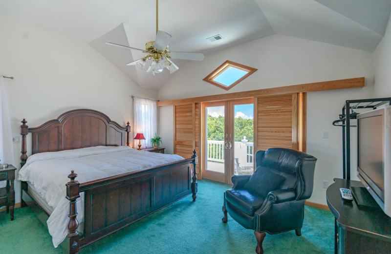 Rental bedroom at Joe Lamb Jr. & Associates Vacation Rentals.
