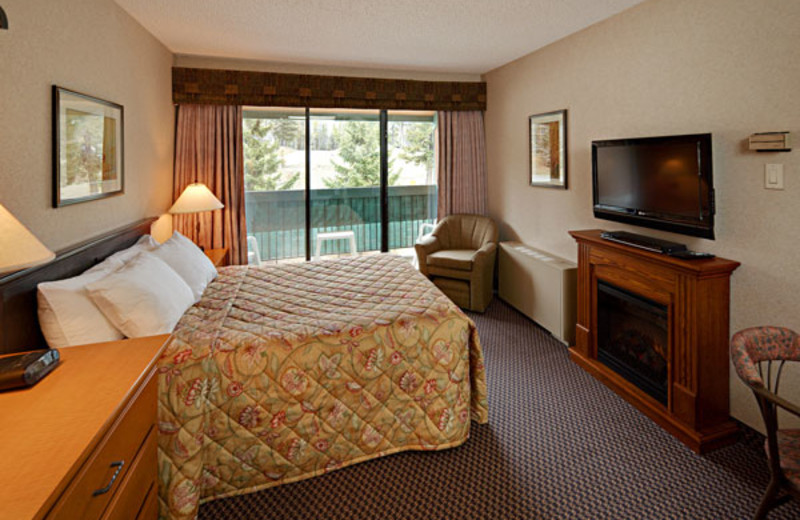 Guest bedroom at Douglas Fir Resort & Chalets.