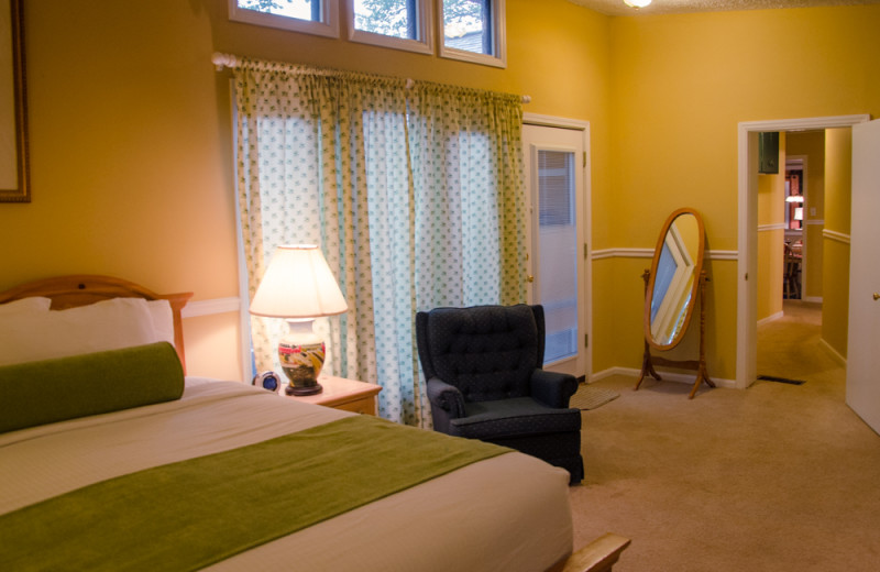 Cabin bedroom at Asheville Cabins of Willow Winds.