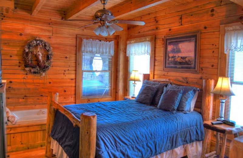 Cabin bedroom at American Mountain Rentals.