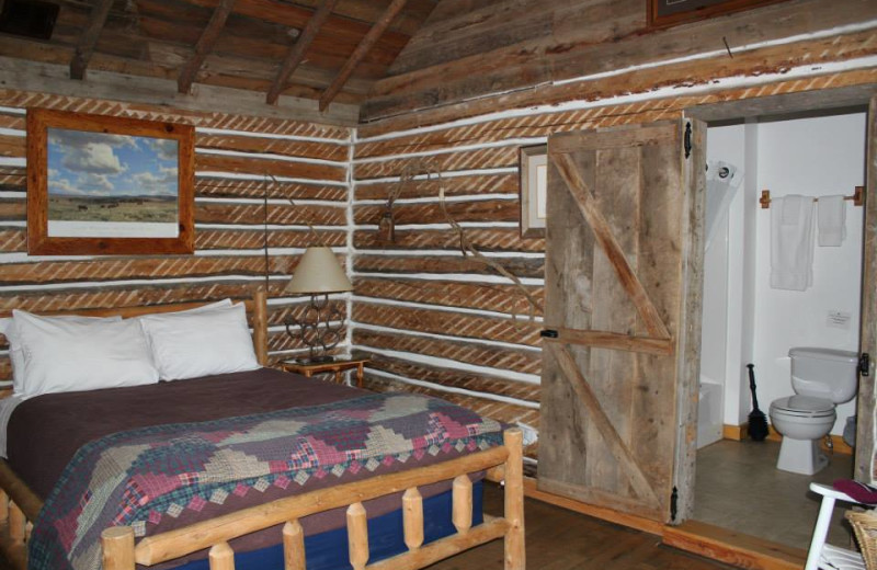 Cabin bedroom at Colorado Cattle Company Ranch.