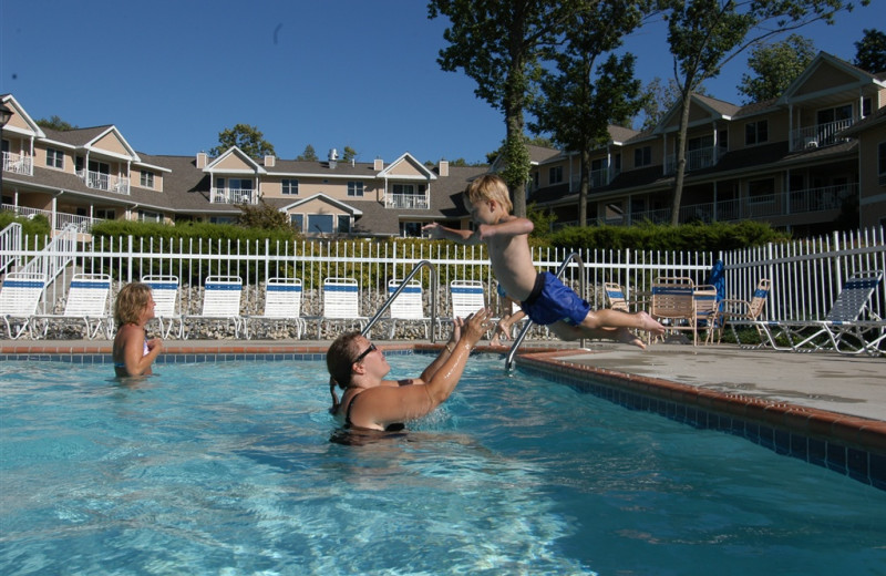 Family playing in the pool at Westwood Shores Waterfront Resort.