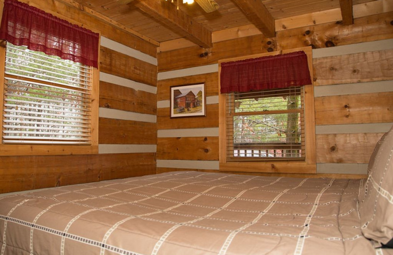 Cabin bedroom at TNT Cabin Rentals.