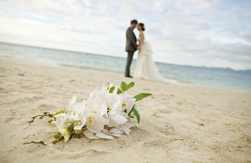 Beach wedding at Aqua Blue Hotel.