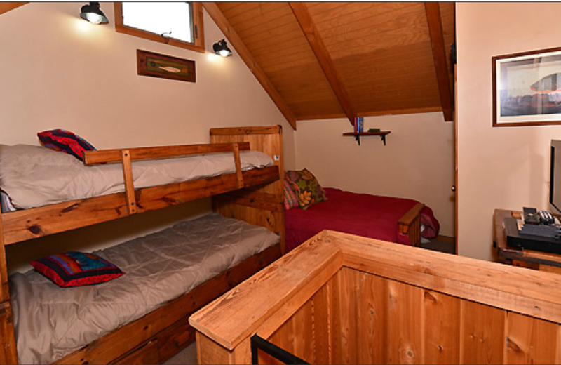 Cabin bedroom at Black Bear Resort Rentals.