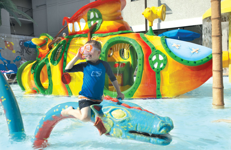 Kid at waterpark at Long Bay Resort.