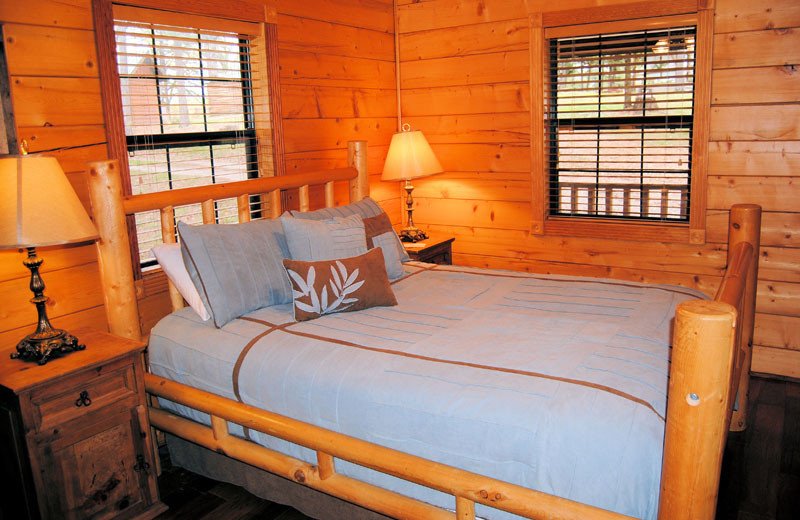 Cabin bedroom at Cabin Fever Resort.