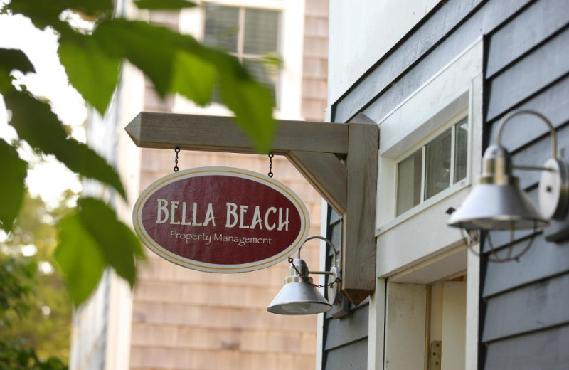 Bella Beach Property Management sign.