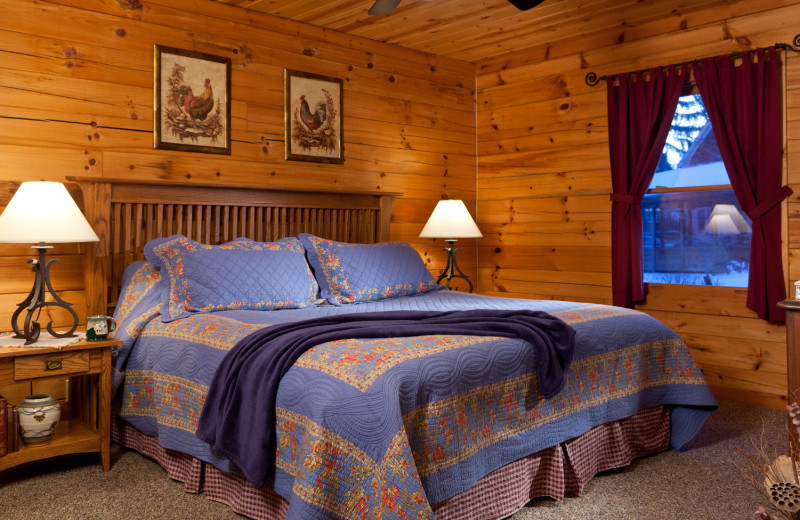 Cabin bedroom at The White Oak Inn.