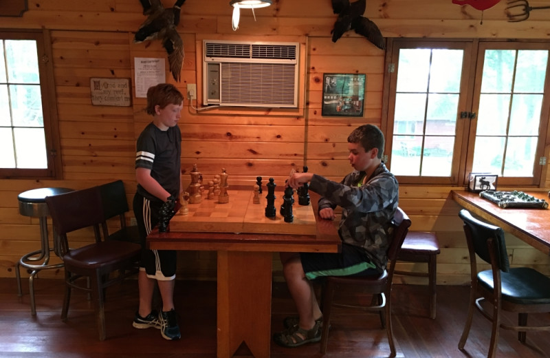 Kids playing chess at Cedar Point Resort.