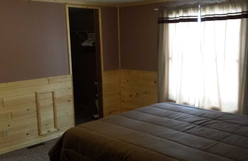 Cabin bedroom at Wilderness Resort.