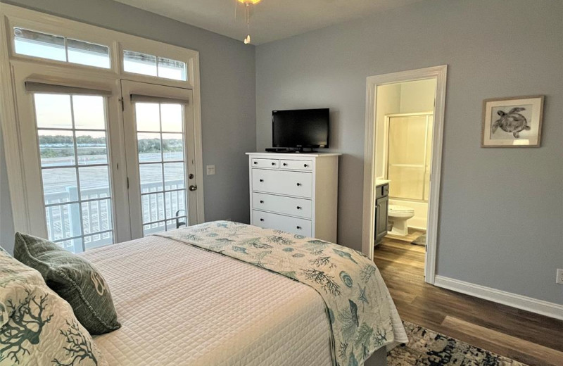 Rental bedroom at Williamson Vacation Rentals.