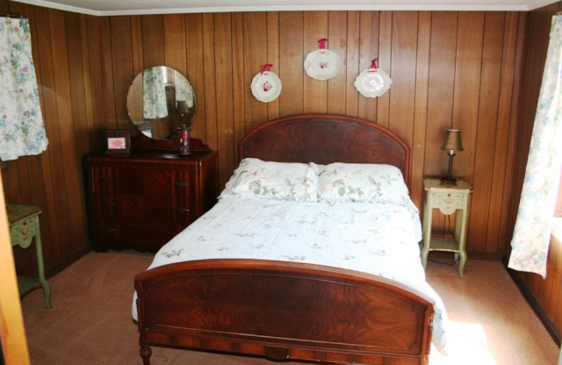 Cottage bedroom at Hemlock Campground & Cottages.