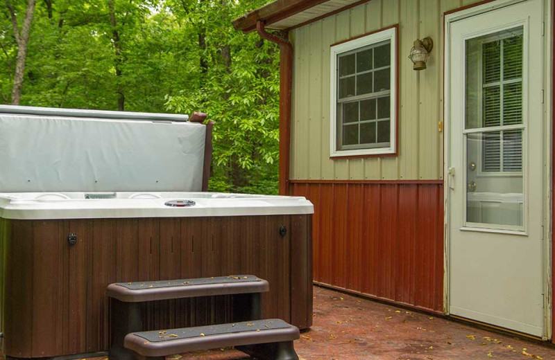 Cabin hot tub at Willowbrook Cabins.