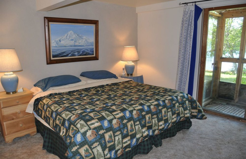 Cabin bedroom at Daniels Lake Lodge Bed & Breakfast.