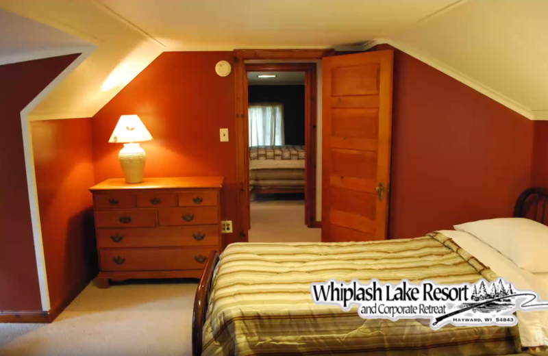 Cabin bedroom at Whiplash Lake Resort.