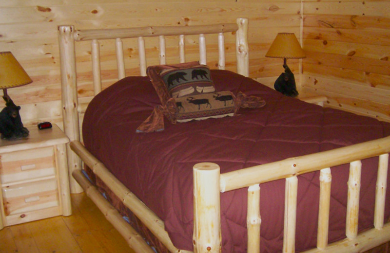 Cabin bedroom at White Oak Lodge & Resort.