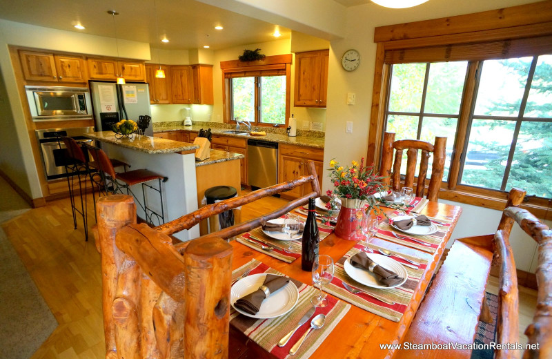 Rental kitchen and dining at Steamboat Vacation Rentals.