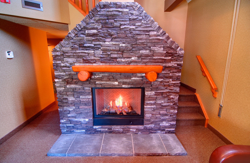 Guest fireplace at Banff Caribou Lodge & Spa.