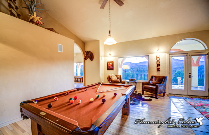 Rental billiard table at Hummingbird Cabins.