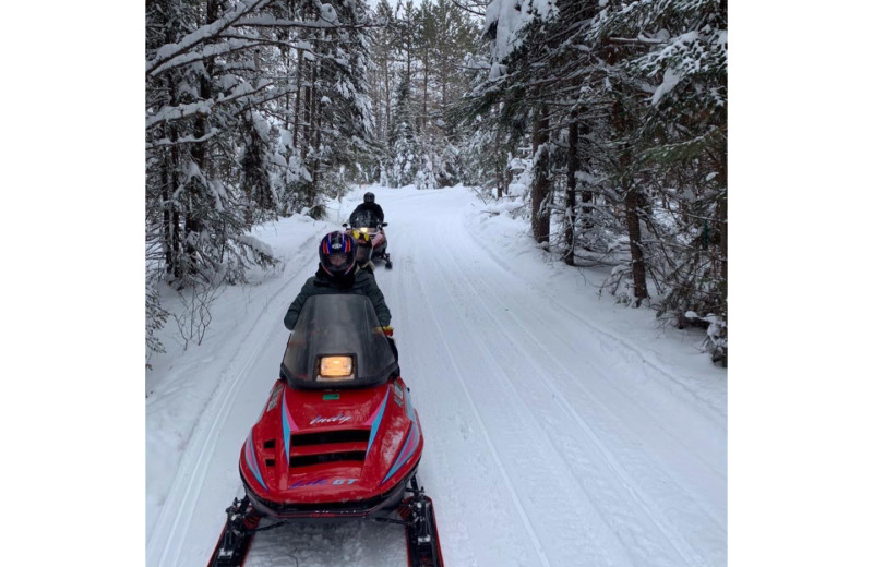 Snowmobiling at Timber Trails Resort.