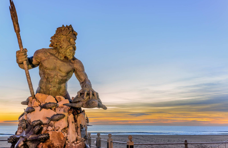 Neptune statue at Atkinson Realty.