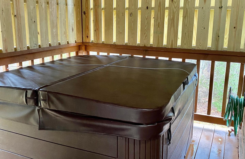 Cabin hot tub at Little Valley Mountain Resort.