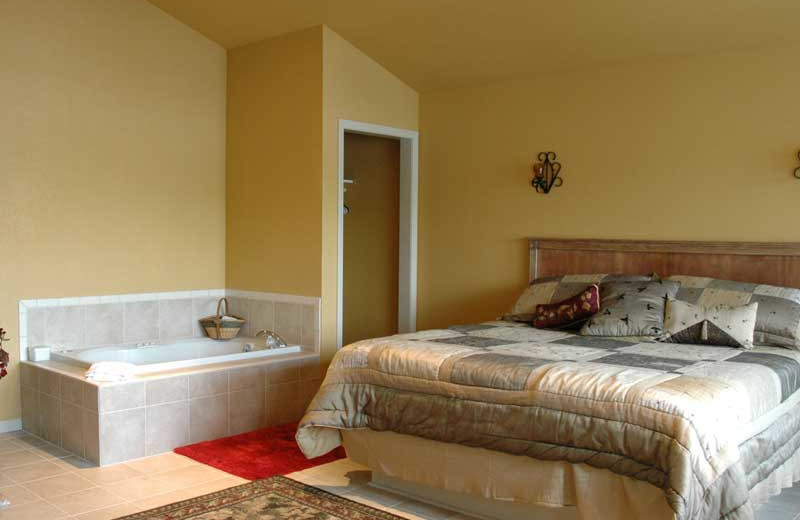 Guest room with hot tub at Point Randall Resort.