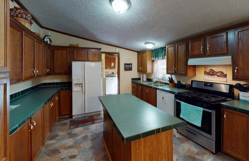 Cabin kitchen at 1st Choice Cabin Rentals.