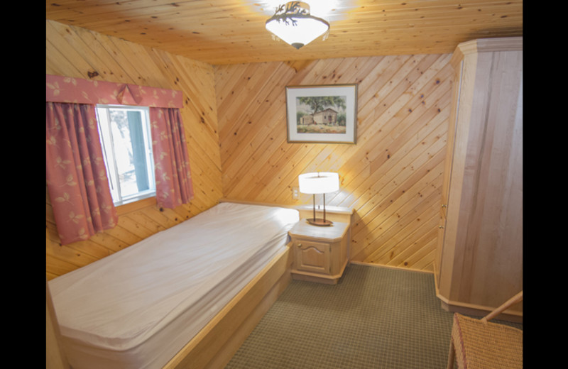 Cabin bedroom at Obabika Resort.