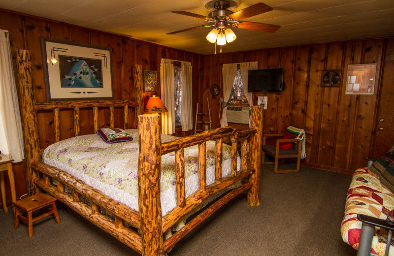 Cabin bedroom at Aunt Grace's Stay N Play Resort.