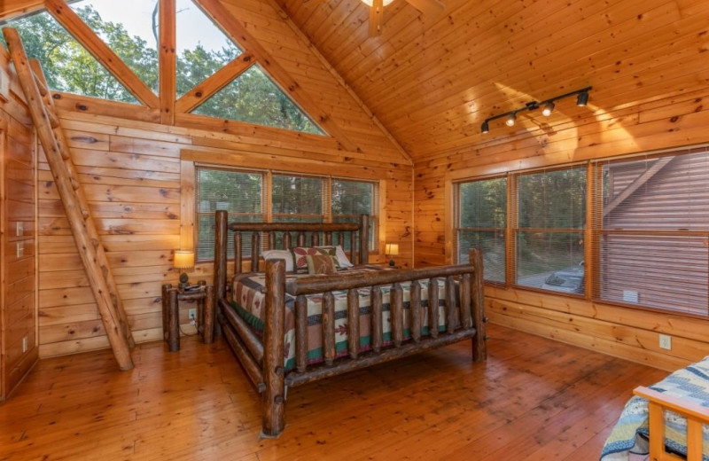 Cabin bedroom at American Patriot Getaways, LLC.