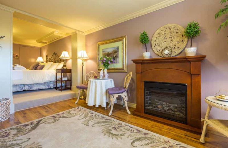 Guest room with fireplace at A Vista Villa Couples Retreat.