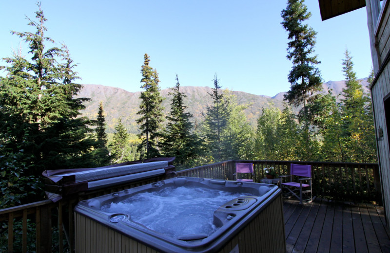 Hot tub overlooking the mountains at Alaska Heavenly Lodge.