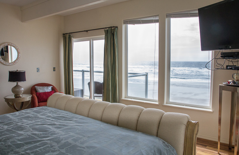 Vacation rental bedroom at Beachfront Vacation Rentals.