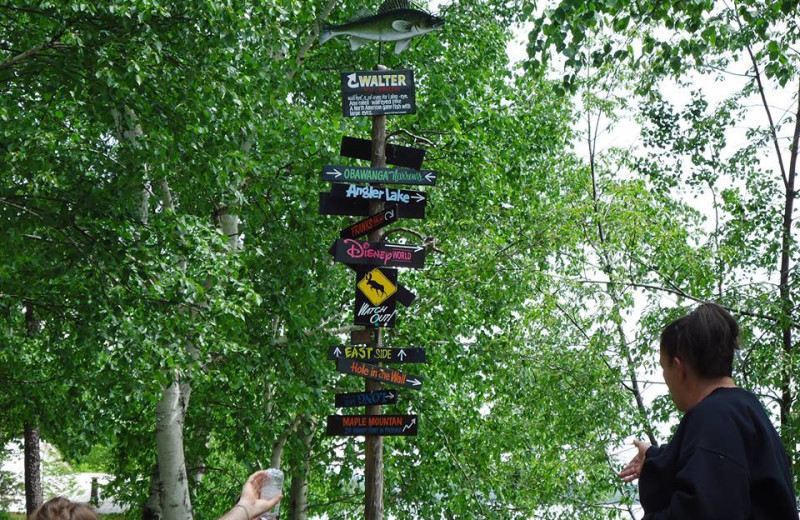 Signs at Red Pine Wilderness Lodge.