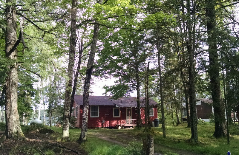 Cabin exterior at The Arrows Resort.