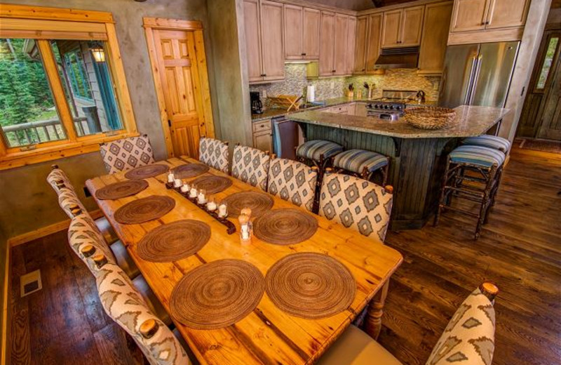 Rental kitchen and dining room at Black Diamond Vacation Rentals.